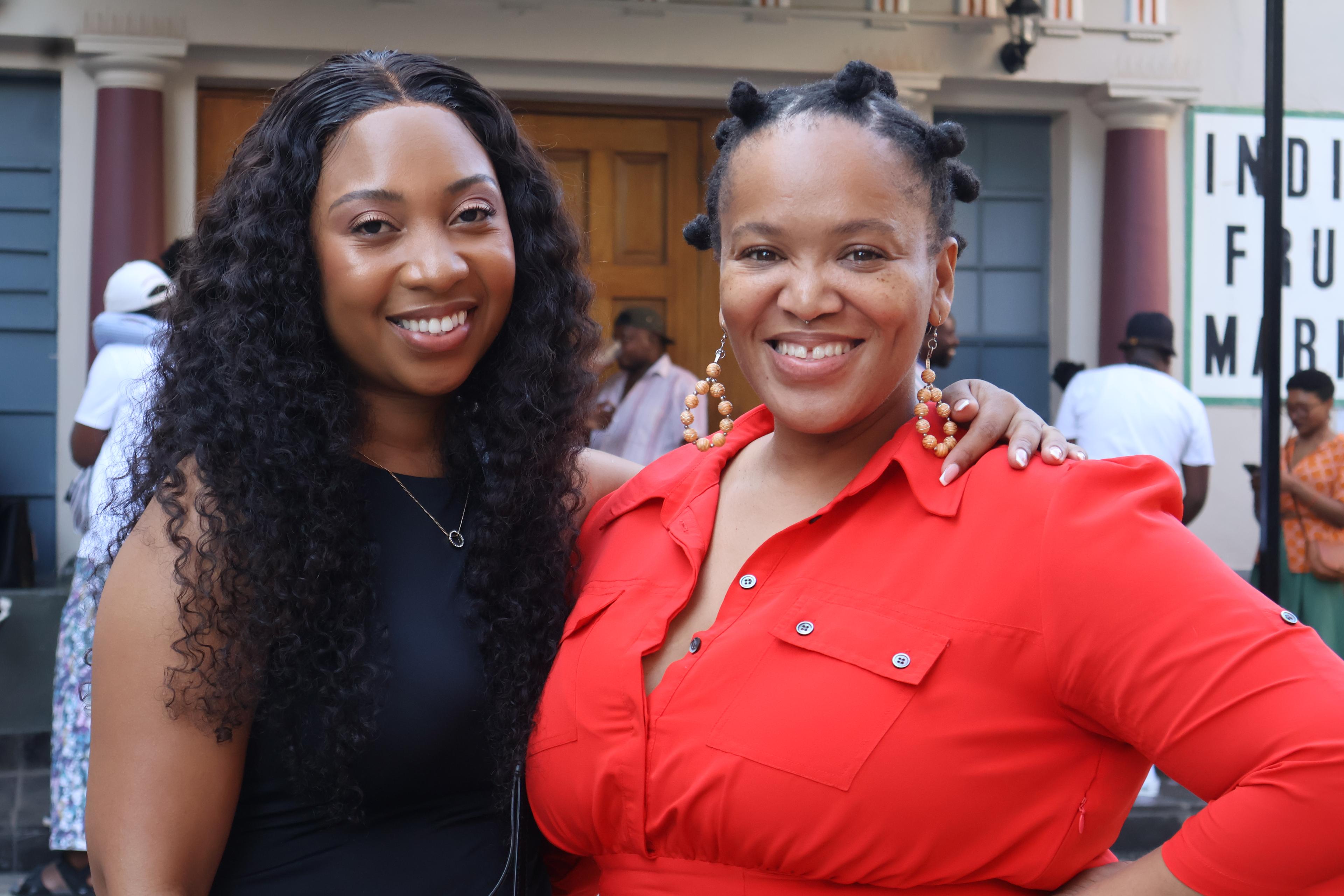 Two women smiling together outdoors